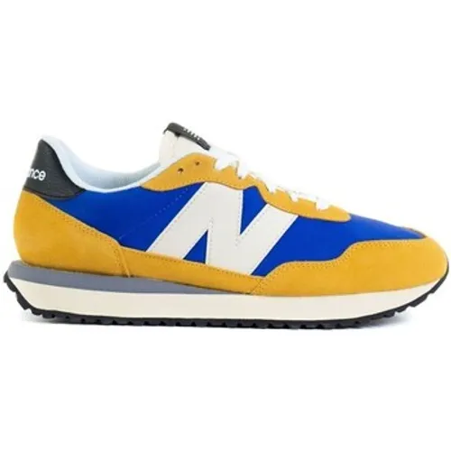 New Balance  237  men's Shoes (Trainers) in Blue