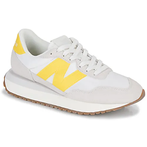 New Balance  237  women's Shoes (Trainers) in Yellow