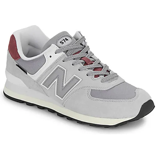 New Balance  574  men's Shoes (Trainers) in Grey