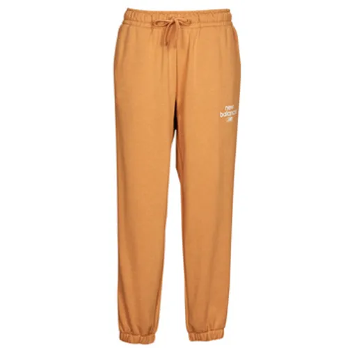New Balance  Essentials Reimagined Archive French Terry Pant  women's Sportswear in Orange