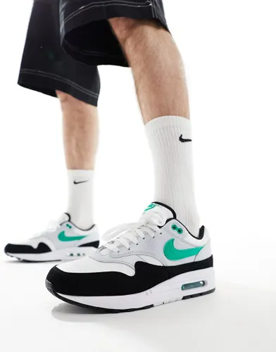 Nike Air Max 1 trainers in white, black and green