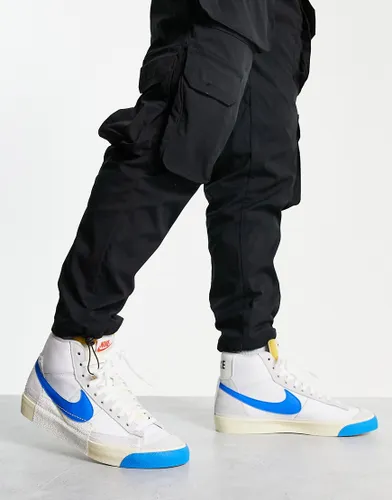 Nike Blazer Mid '77 trainers in white and blue