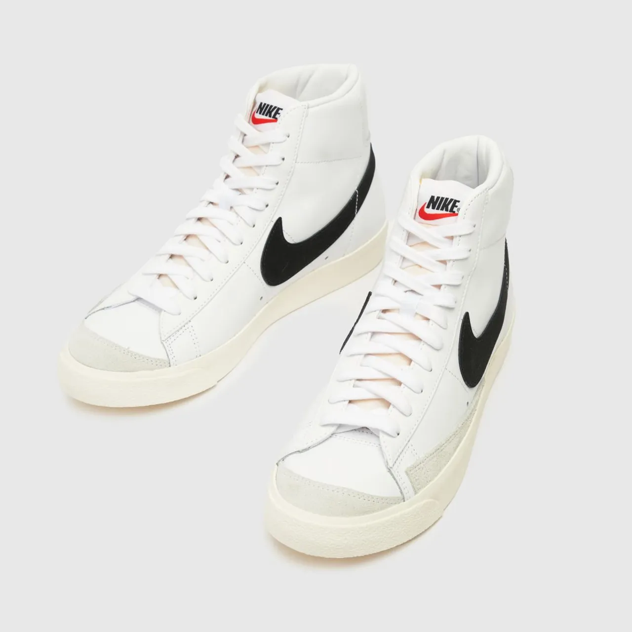 Nike Blazer Mid 77 Vintage Trainers In White & Black
