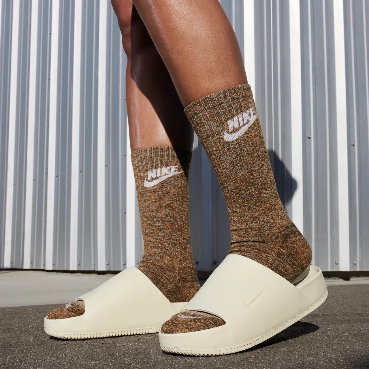 Nike Calm Women's Slides - Brown