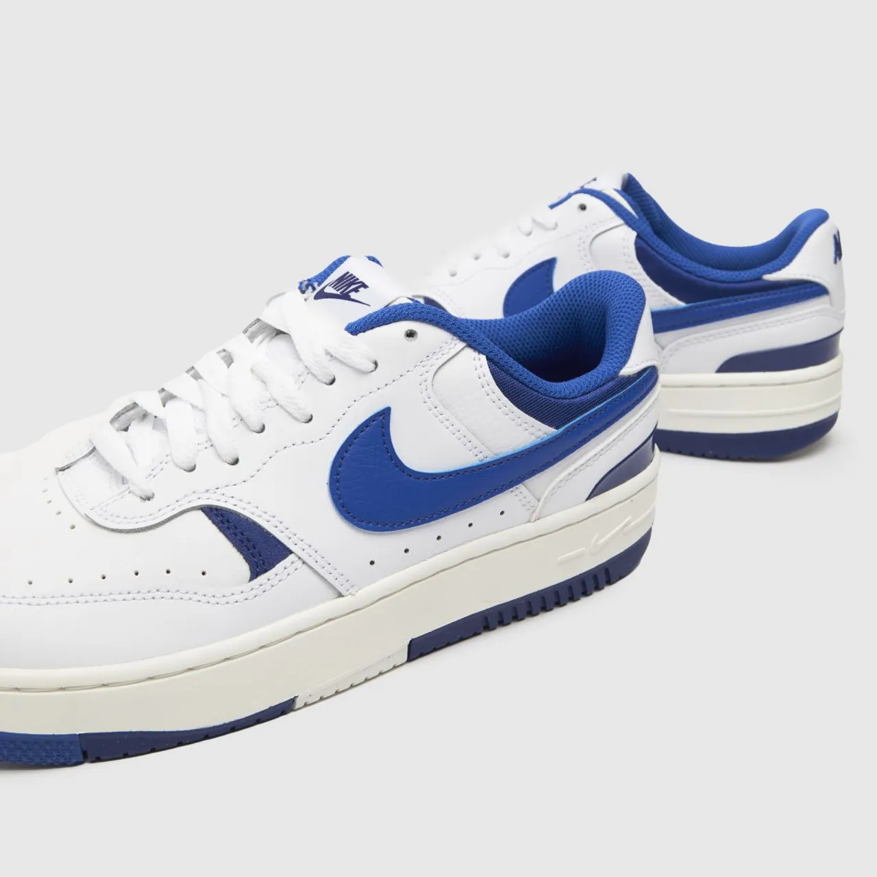 Nike Gamma Force Trainers In White & Blue