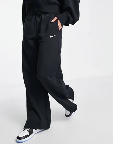 Nike mini swoosh high rise wide leg joggers in black and sail