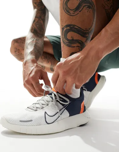 Nike Running Free Run Flyknit NN trainers in grey and orange