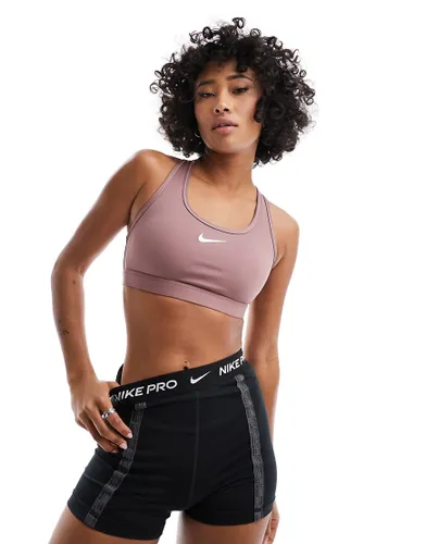 Nike Training Swoosh Dri-Fit medium support bra in smokey mauve-Neutral