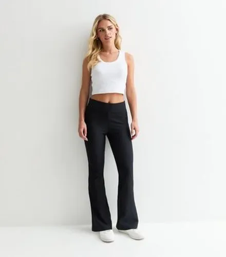 Petite Black Ribbed Jersey Flared Trousers New Look
