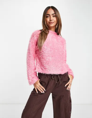 Pieces exclusive fluffy flared sleeve jumper in pink