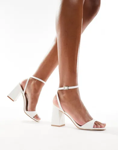 RAID Wink 2 block heeled sandals in white