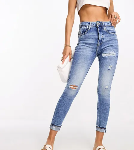 River Island Petite high rise sculpt skinny jean with ripped knees in mid blue wash