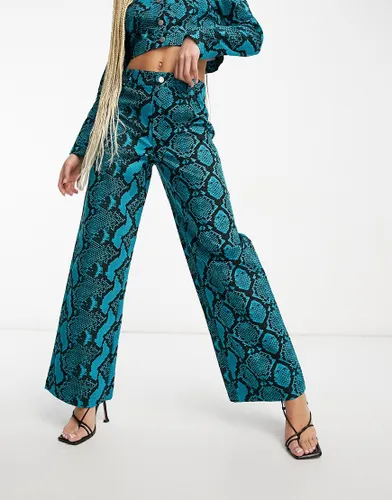 Something New X Madeleine Pedersen wide leg trouser co-ord in blue and black snake print