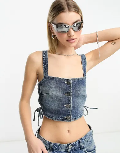 Stradivarius STR denim crop top with lace up side in washed blue