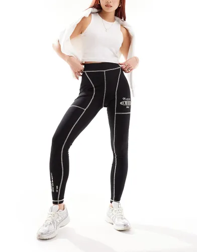 The Couture Club oversized graphic leggings with contrast stitch in black-Blue