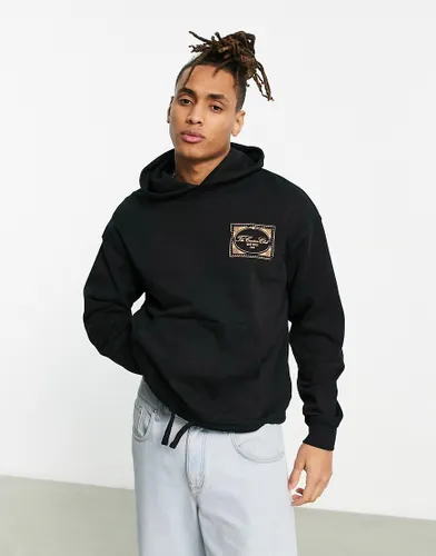 The Couture Club oversized hoodie in black with stamp logo print and drawcord hem