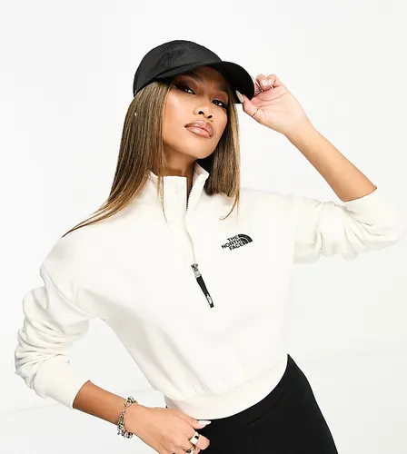The North Face cropped 1/4 zip sweatshirt in off white Exclusive at ASOS