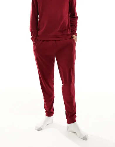 Tommy Hilfiger ribbed logo waistband jogger in burgundy-Red