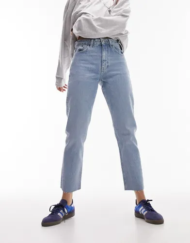 Topshop cropped mid rise straight jeans with raw hems in bleach-Blue