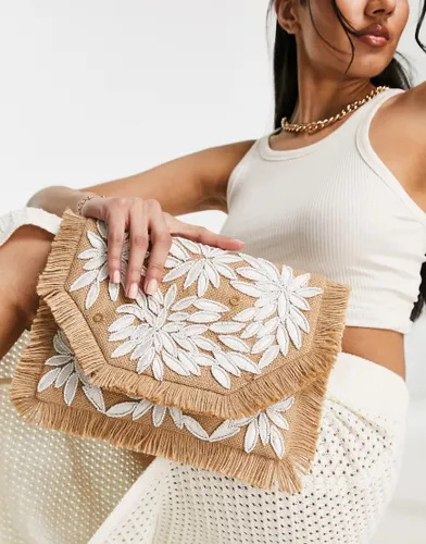 True Decadence straw envelope clutch bag in straw with white floral embroidery-Neutral