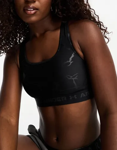 Under Armour crossback mid support emboss bra with graphic print in black