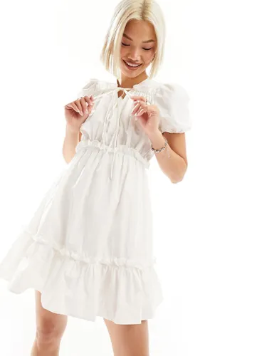 Urban Revivo tie-detail ruffle mini dress in white