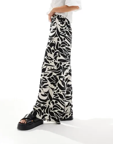 Wednesday's Girl abstract print wide leg trousers in black and white