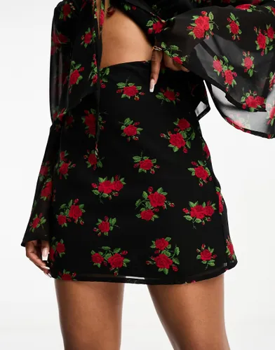 Wednesday's Girl rose print bias cut mini skirt co-ord in black and red